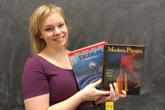 Student holding books