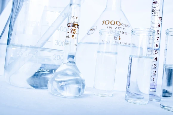 Flasks in a lab. Students earning a masters in biology degree 
