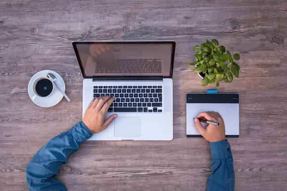 laptop with hands 