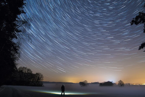 Stars trails in the sky. Fredonia students with a physics degree can study the earth's place in the cosmos. 