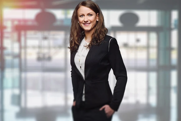 Professional woman. Business Management degree students can go on to lead in the business world. 