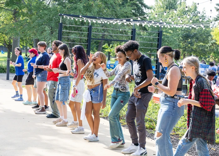 Students dancing outside