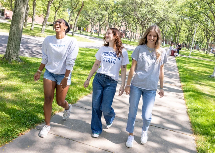 Student ambassadors walking across campus