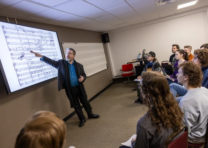 music professor teaching a composition class