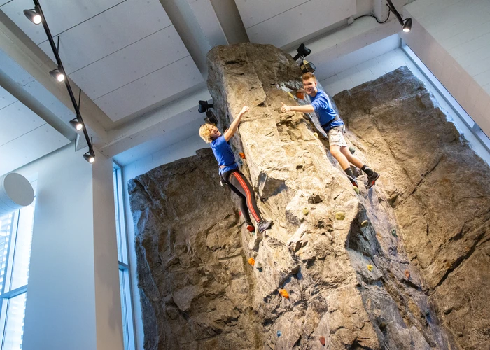 Fredonia students on the rock climbing wall
