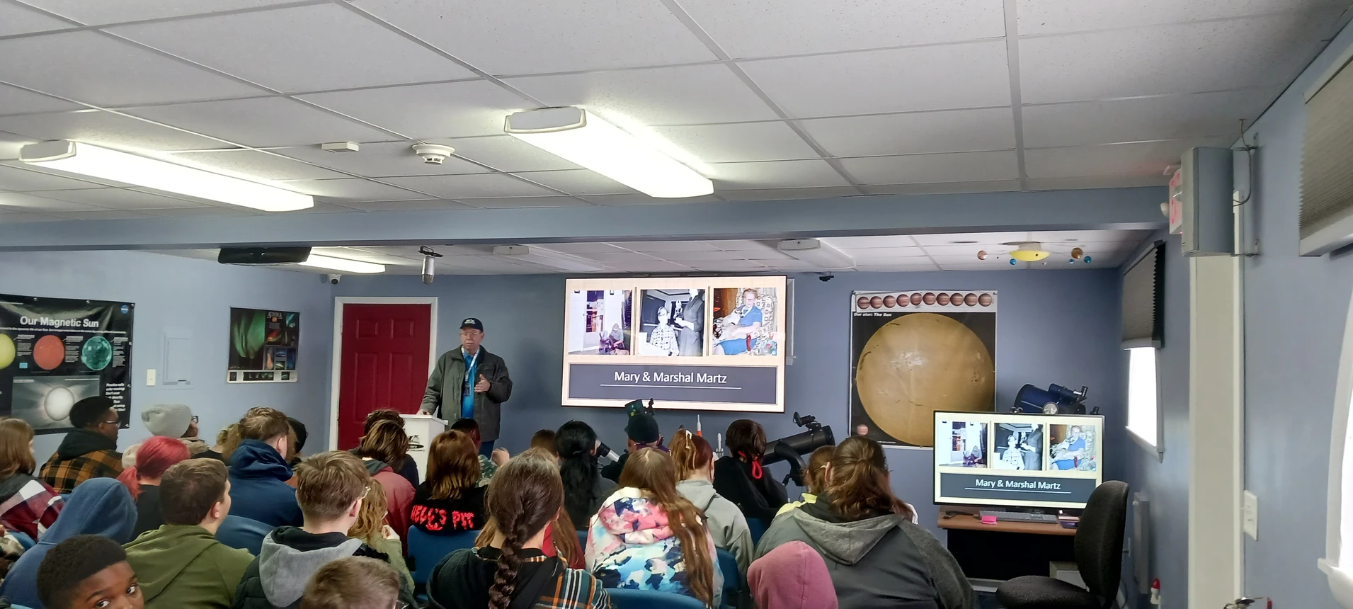 Students listen to a presentation on Astronomy at the Martz Observatory