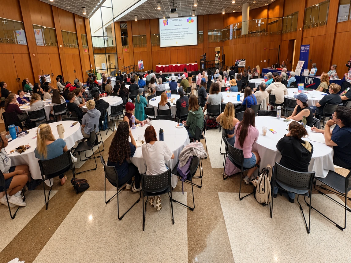 Audience members seated at tables during Fredonia’s 2026 Constitution Day program in the Williams Center.