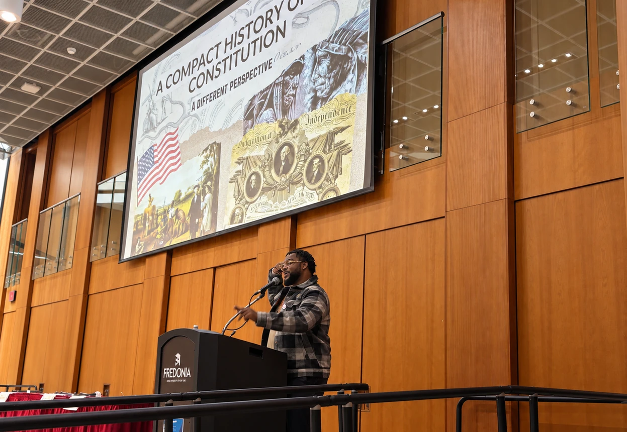 Speaker delivers the 2026 Constitution Day address at a podium in the Williams Center.