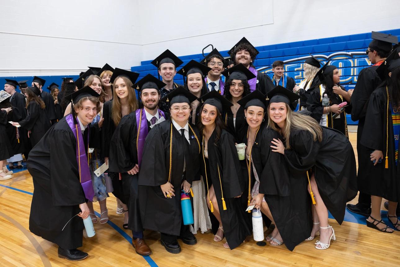Graduates posing for a photo before the ceremony