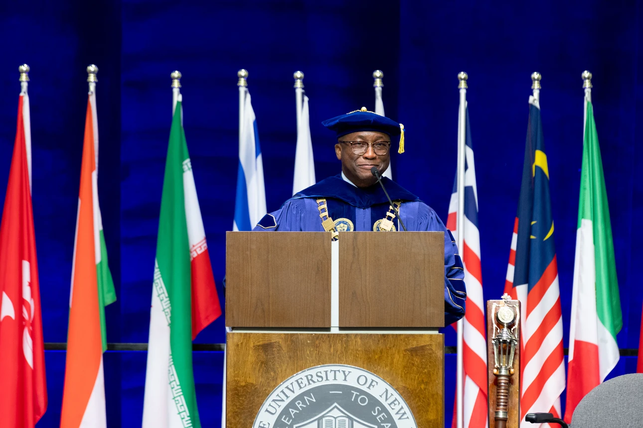 President Kolison speaking to audience at commencement