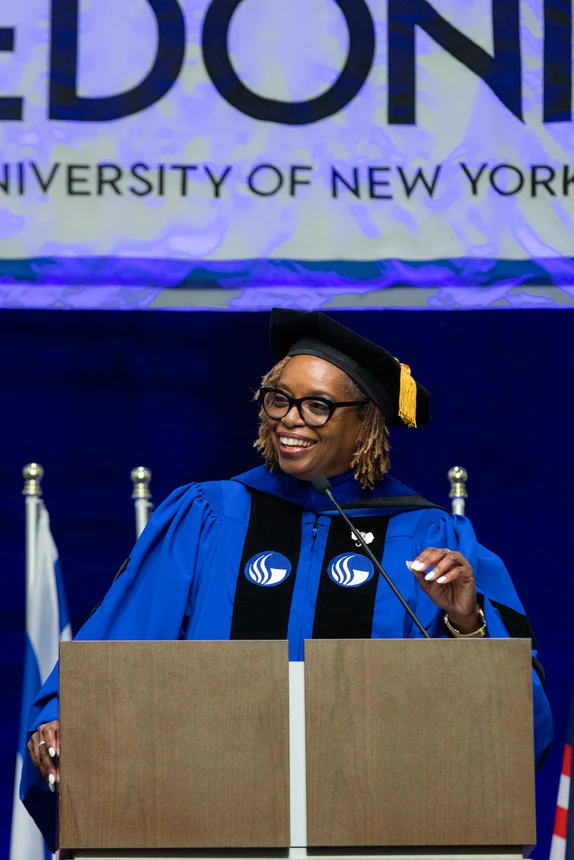 Kim Harrington speaking at commencement