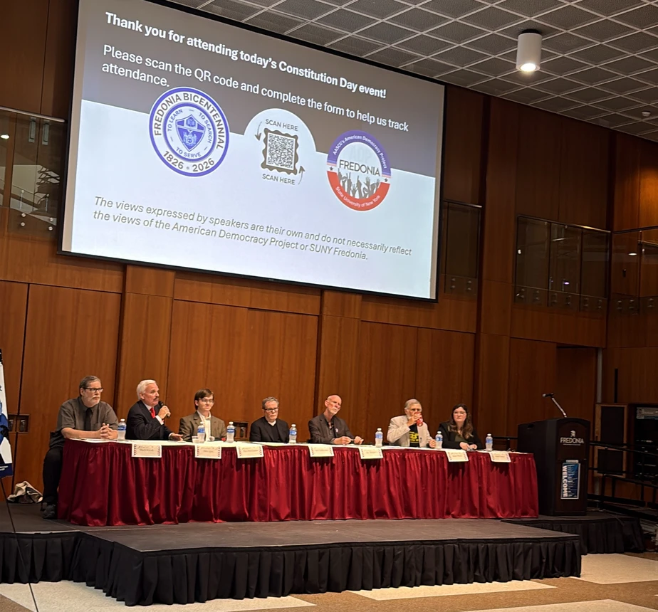 Panelists seated on stage during Fredonia’s 2026 Constitution Day Public Media and Democracy panel.
