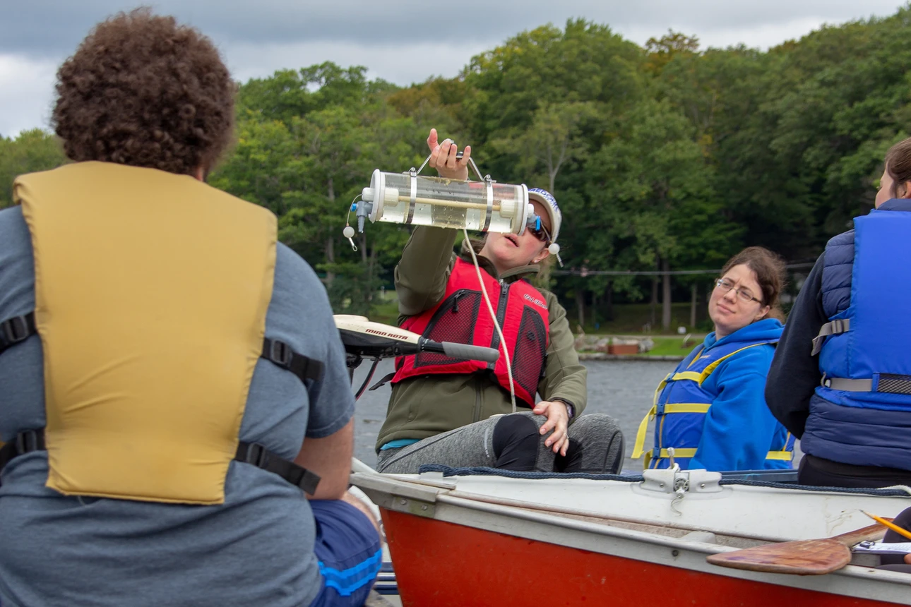 Students in Dr. Courtney Wigdahl-Perry's Aquatic Biology class collect water samples from Bear Lake.