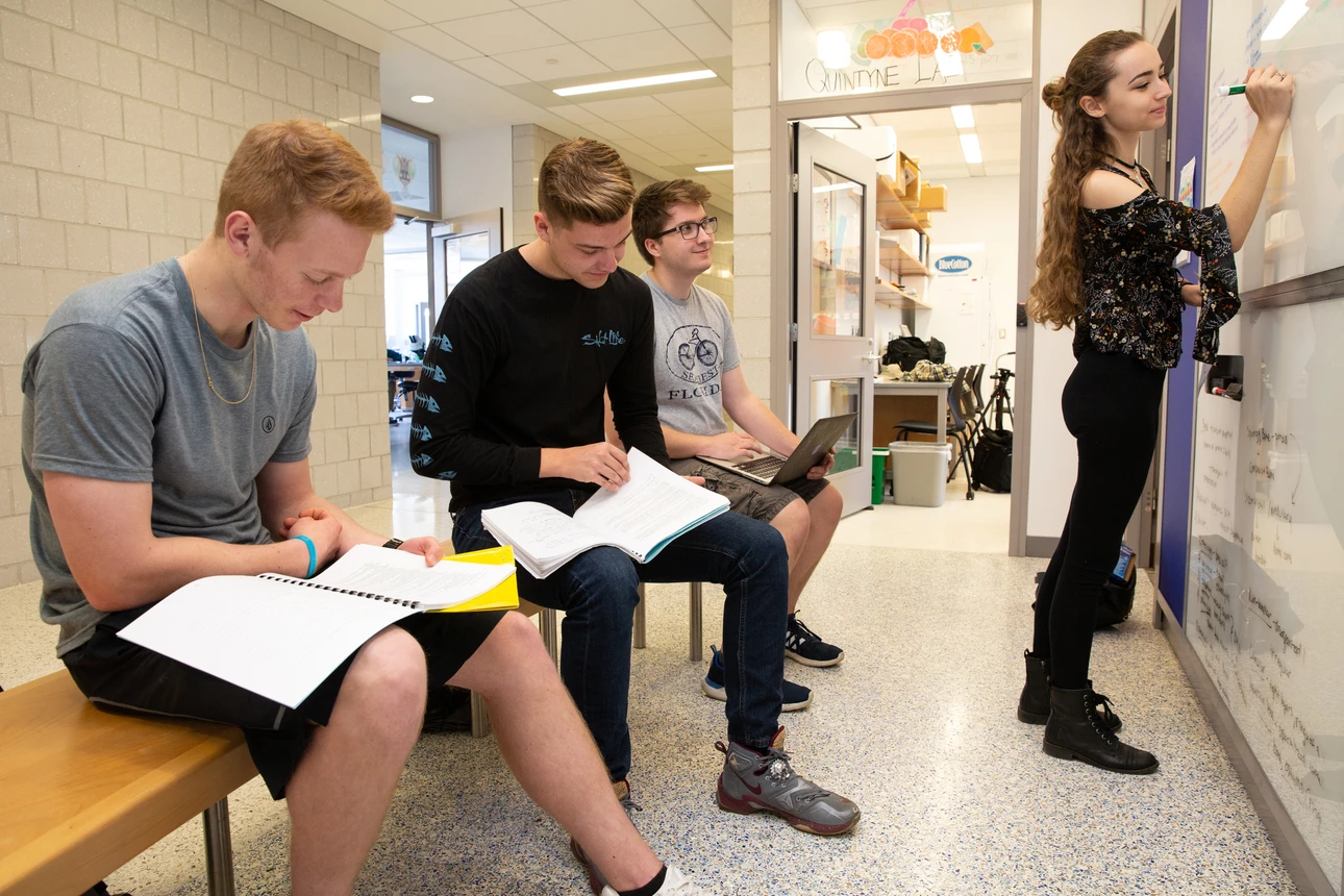 students collaborate in the study alcove