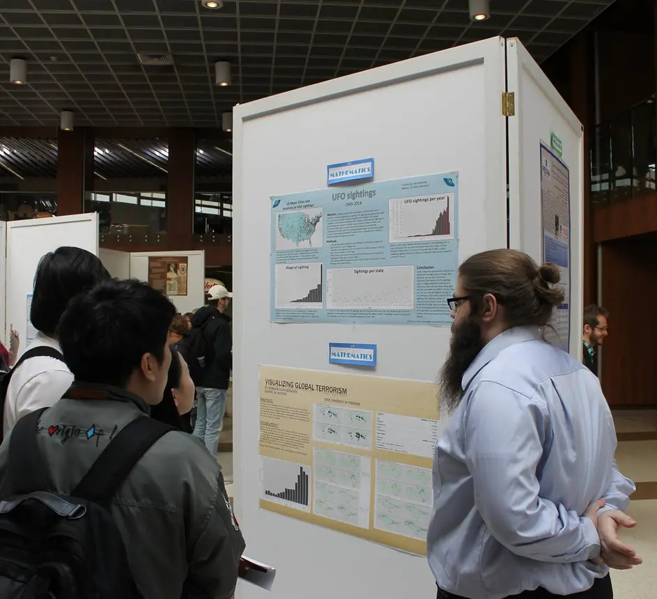 Students at past expo poster session.