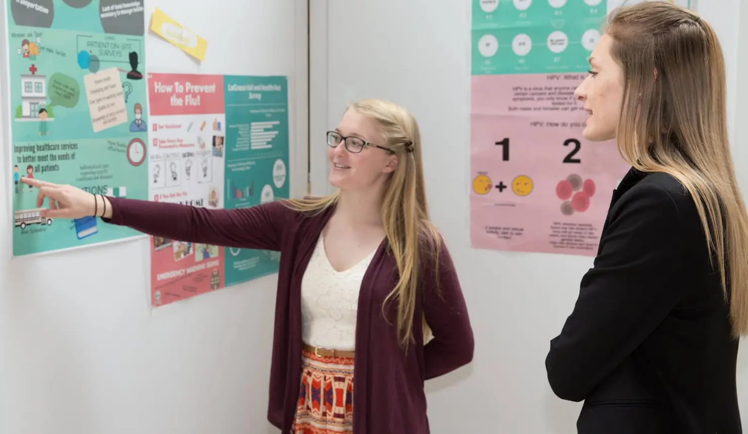 Students at past expo poster session.