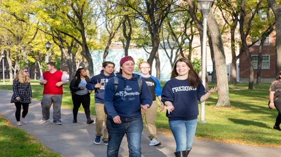 Fredonia students walking across campus. Fredonia is one of the most affordable universities in the country, and everyone is invited to visit Fredonia for Open House to see for themselves. open house