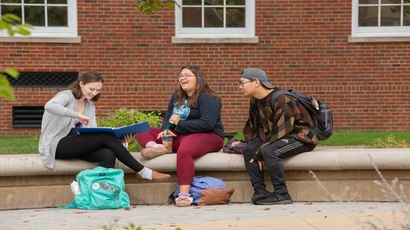 Fredonia students having a chat on campus