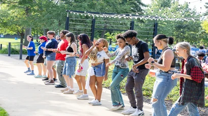 students dancing during the street festival on campus