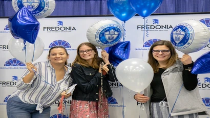 scholarship winners pose for a photo as scholars breakfast