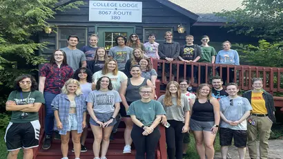 Group photo of tutors at the college lodge for traing