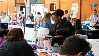 Student applies for positions at job fair event
