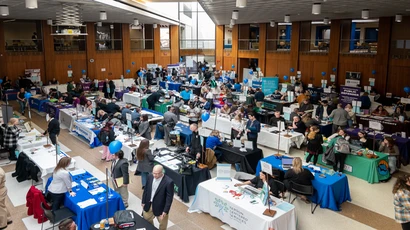 Students and Employers network at job fair event