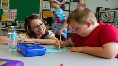 Cooperating teacher Jenny Sobilo with a student.