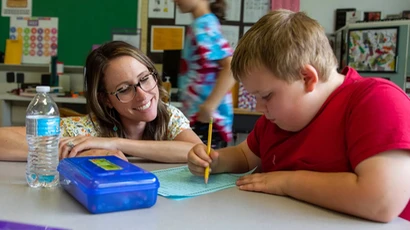 Cooperating teacher Jenny Sobilo with a student.