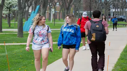 Students enjoying a sunny day on Fredonia's campus