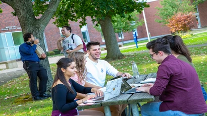 students at picnic table