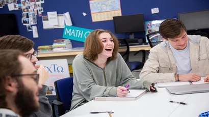 Students at a table studying