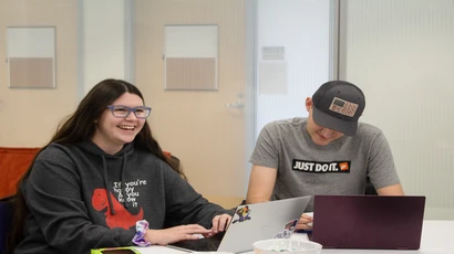 students sitting in front of computer