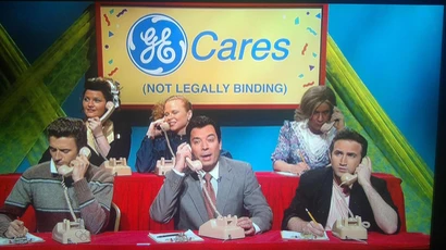 Nick Bernardone with Saturday Night Live members in skit with phones