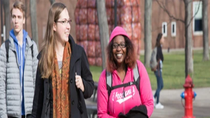 students walking across campus