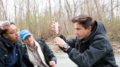 Students collect water samples