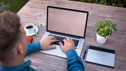 man using a laptop