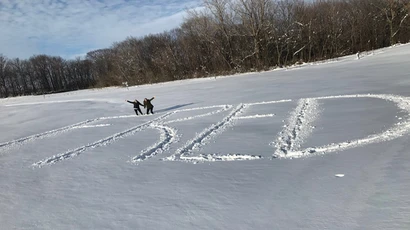 students wrote "FRED" in the snow after a storm