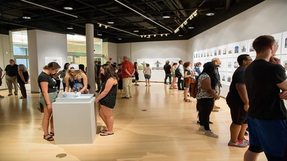 attendees at a gallery opening at Marion Art Gallery