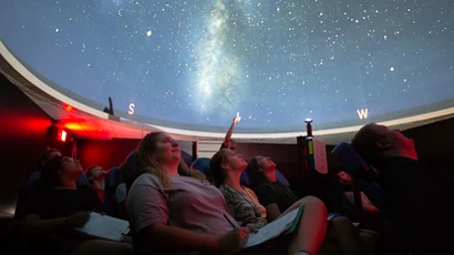 Astrophysicist Enlightens Campus, Community with Portable Planetarium