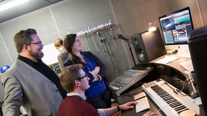Graduate Music Composition program faculty member with students