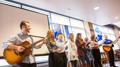 School of Music Music Therapy students gathering to perform in the music therapy masters 