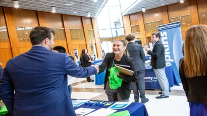 Fredonia Business students at a meet the professionals event ; economist economics major, econ major, What is economics? economics degree, econ major