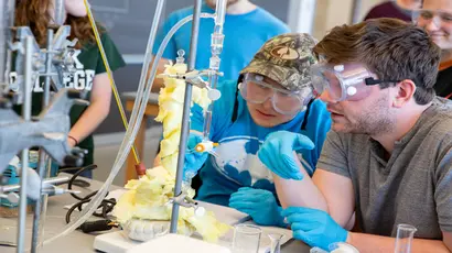 Fredonia chemistry students conducting an experiment in the chemistry lab while majoring in chemistry