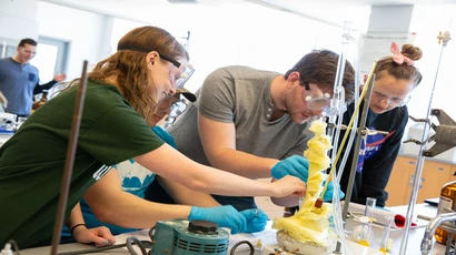 Fredonia students work together on an experiment in a lab; chemistry major, chemistry degree; majoring in chemistry