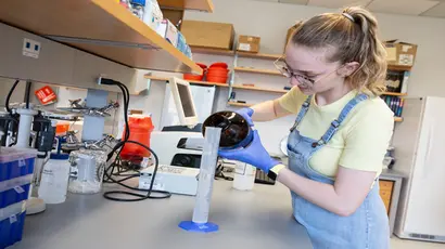 A Fredonia student works in a lab. Molecular genetics degree, molecular genetics major, degree in molecular genetics. 