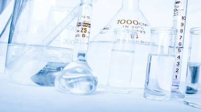 closeup of flasks and beakers in a chemistry lab, chemistry teacher degree, chemistry teaching, chemistry teacher college, degree in chemistry teacher, teacher certification 
