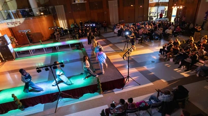 students participate in fashion show in Williams Center