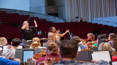 Valerie Coleman works with School of Music students from the College Symphony 