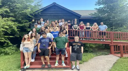 Group photo of tutors at the college lodge for traing